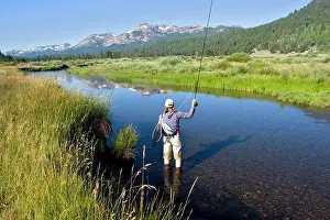 35 Years Prints: Young woman fly fishing the West Fork of the Carson River in Hope Valley Lake Tahoe