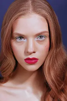 Facial Expression Prints: Young woman with long red wavy hair, green eyeshadows, red lipstick