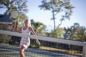 20 To 25 Years Prints: Young woman playing tennis