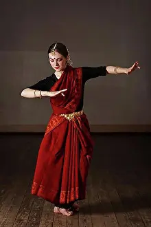 Indians Prints: Young woman in sary dancing classical traditional indian dance Bharat Natyam
