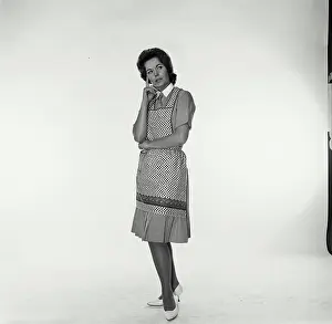 Heels Prints: Young woman thinking