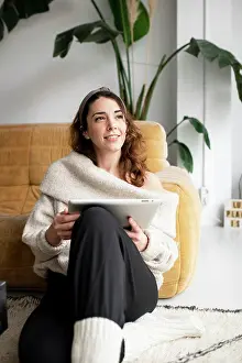 Cyberspace Prints: Young woman using digital tablet at home