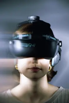 Innovation Prints: Young woman wearing a Virtual Reality Simulator
