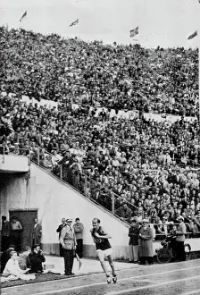 Newspaper Prints: Zatopek Enters Stadium To Win Marathon -- The her of the VT Olympiad
