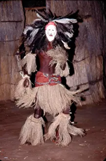 Zimbabwe Prints: Zimbabwe, Victoria Falls. Ostrich Feather Masked Dancer